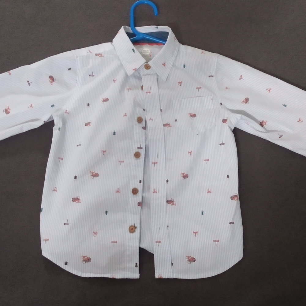 Buttoned up boys dress shirt.